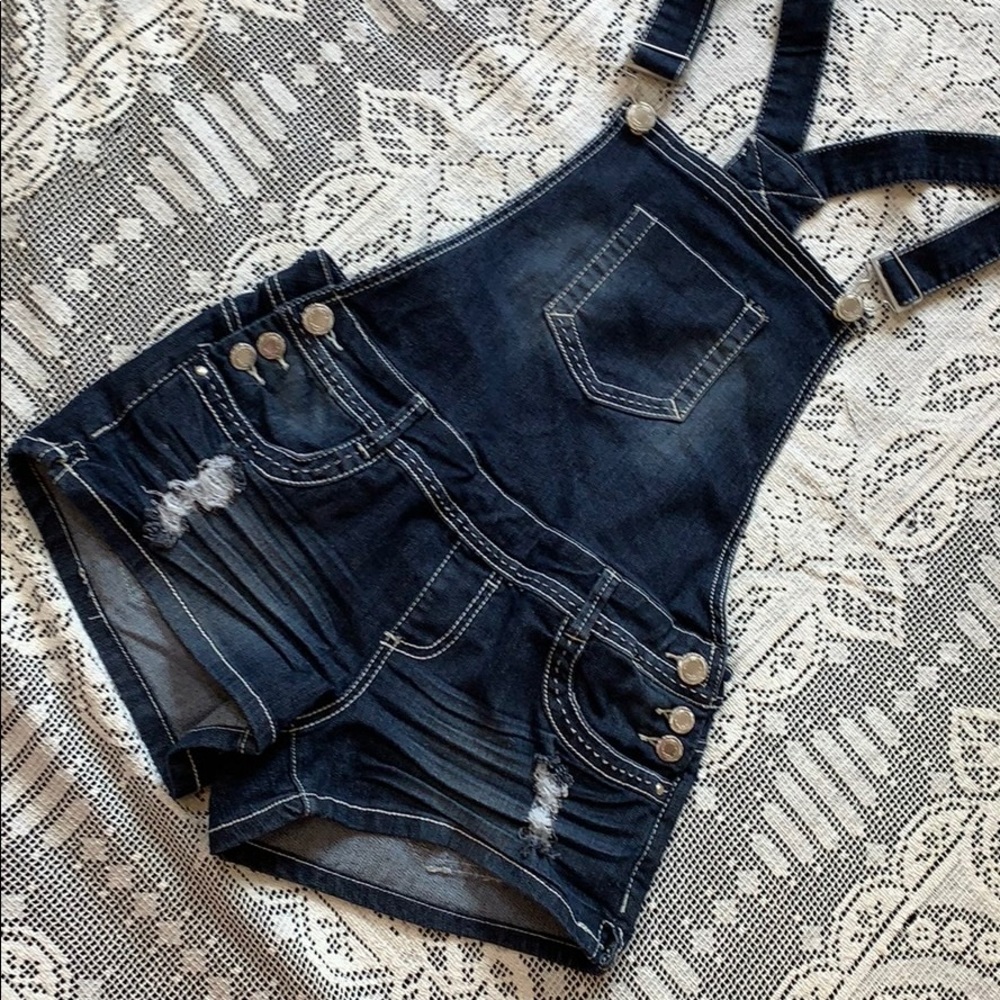 Juniors size 7 Almost Famous Distressed overalls.